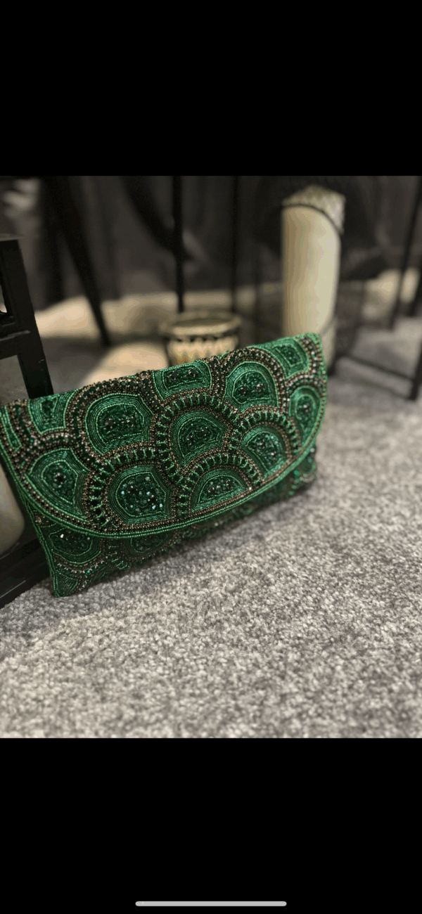 Emerald green beaded clutch bag