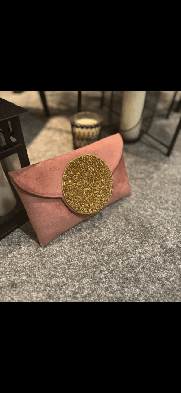Pink velvet clutch bag