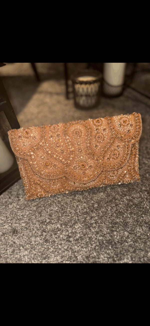 Pink beaded clutch bag
