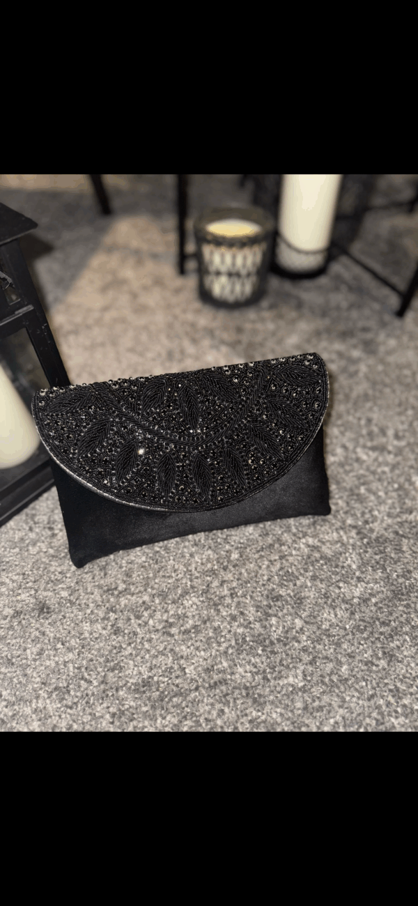 Black velvet clutch bag