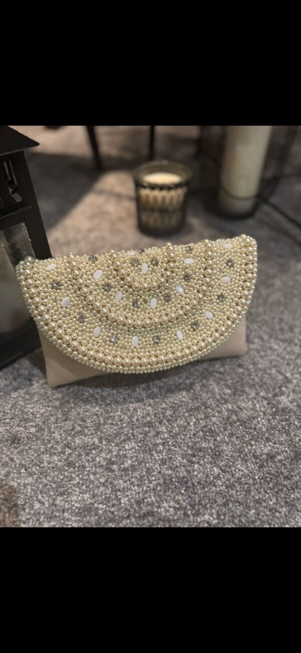 Cream pearl clutch bag