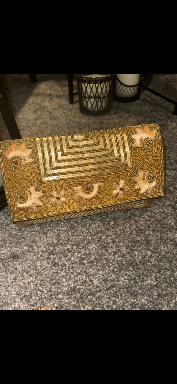 Gold clutch bag