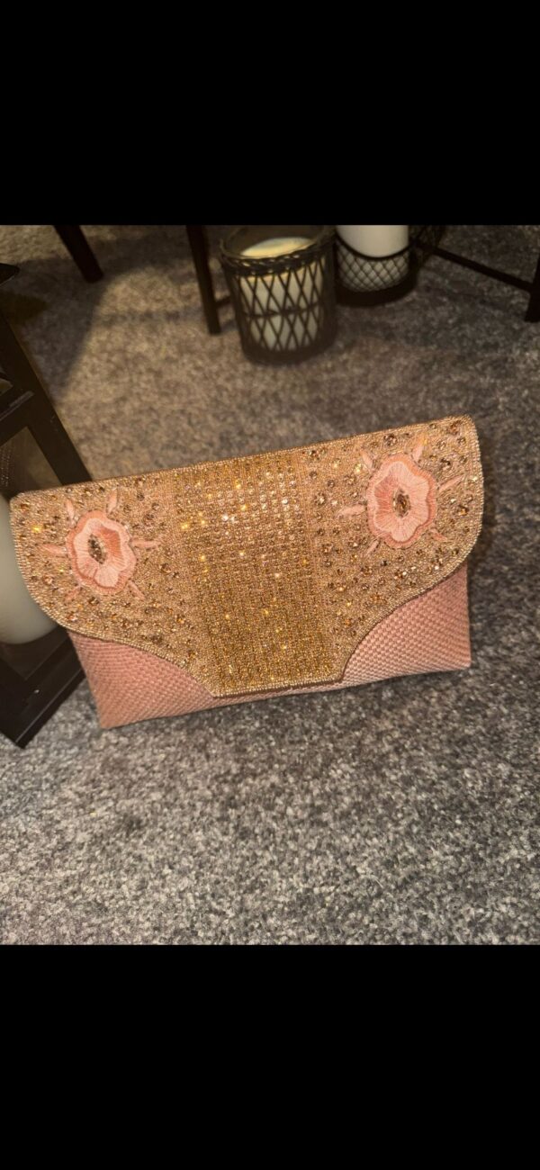 Pink clutch bag